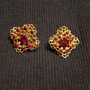 Vintage Pair of red rhinestone filigree brooches